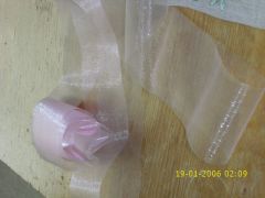 Vaaleanpunainen läpikuultava organzanauha